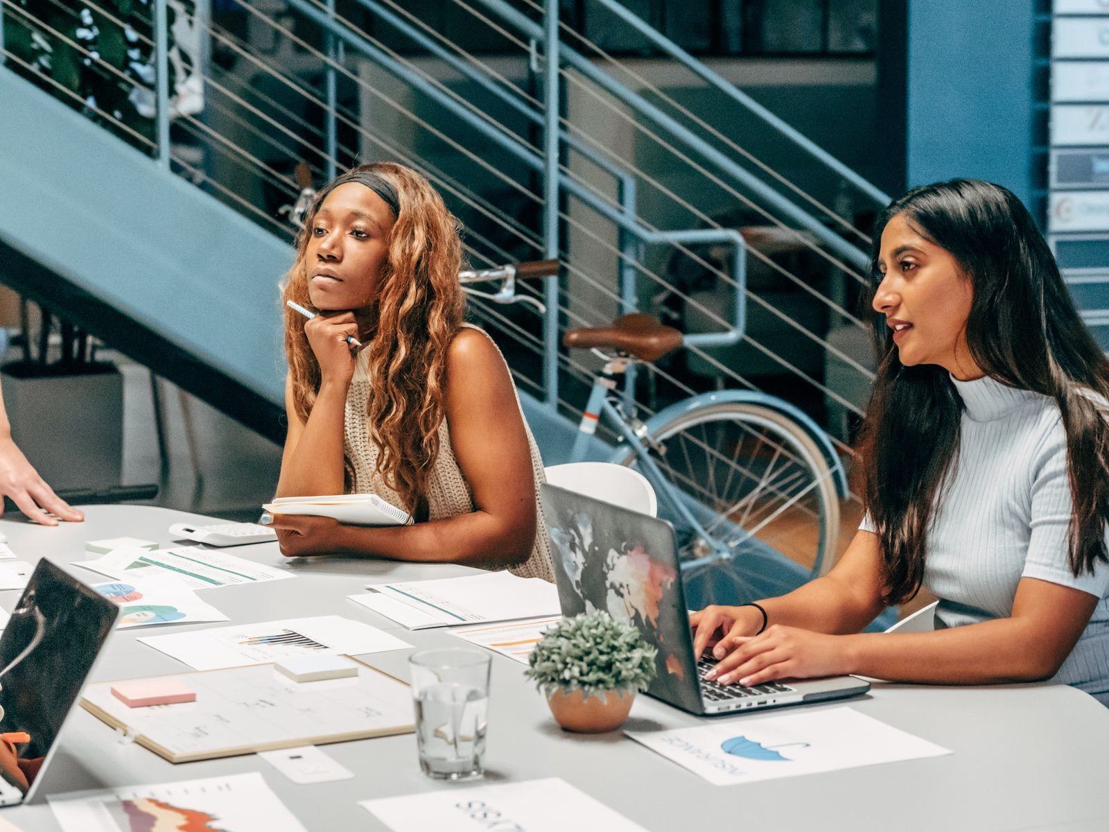 Colleagues contributing during a working meeting